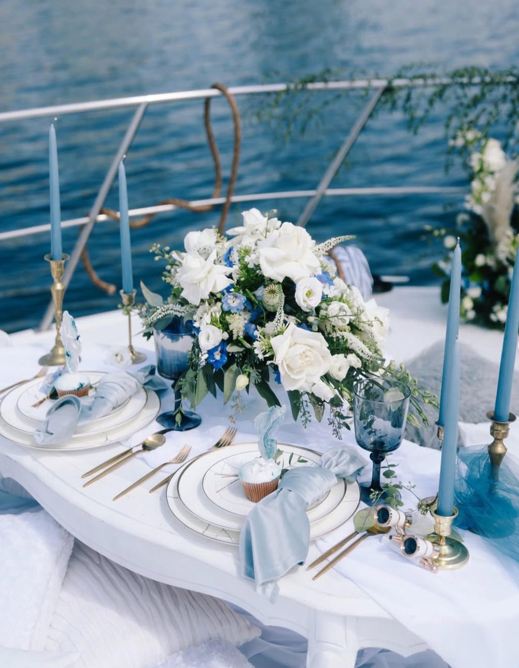Carrara Marble Charger styled for an elegant waterfront wedding reception with white florals and modern table décor.
