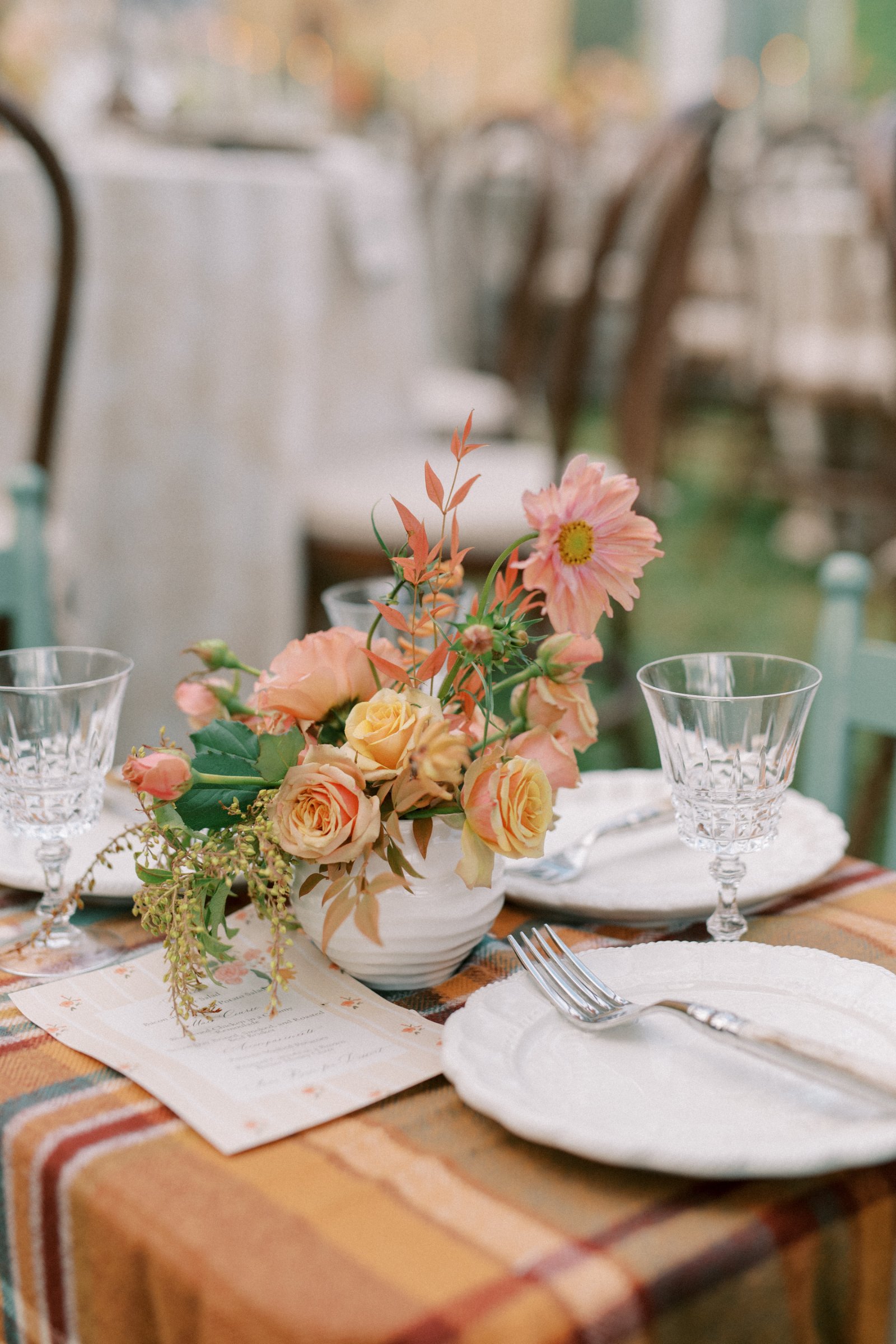 Vintage crystal water goblets styled on an elegant wedding reception table