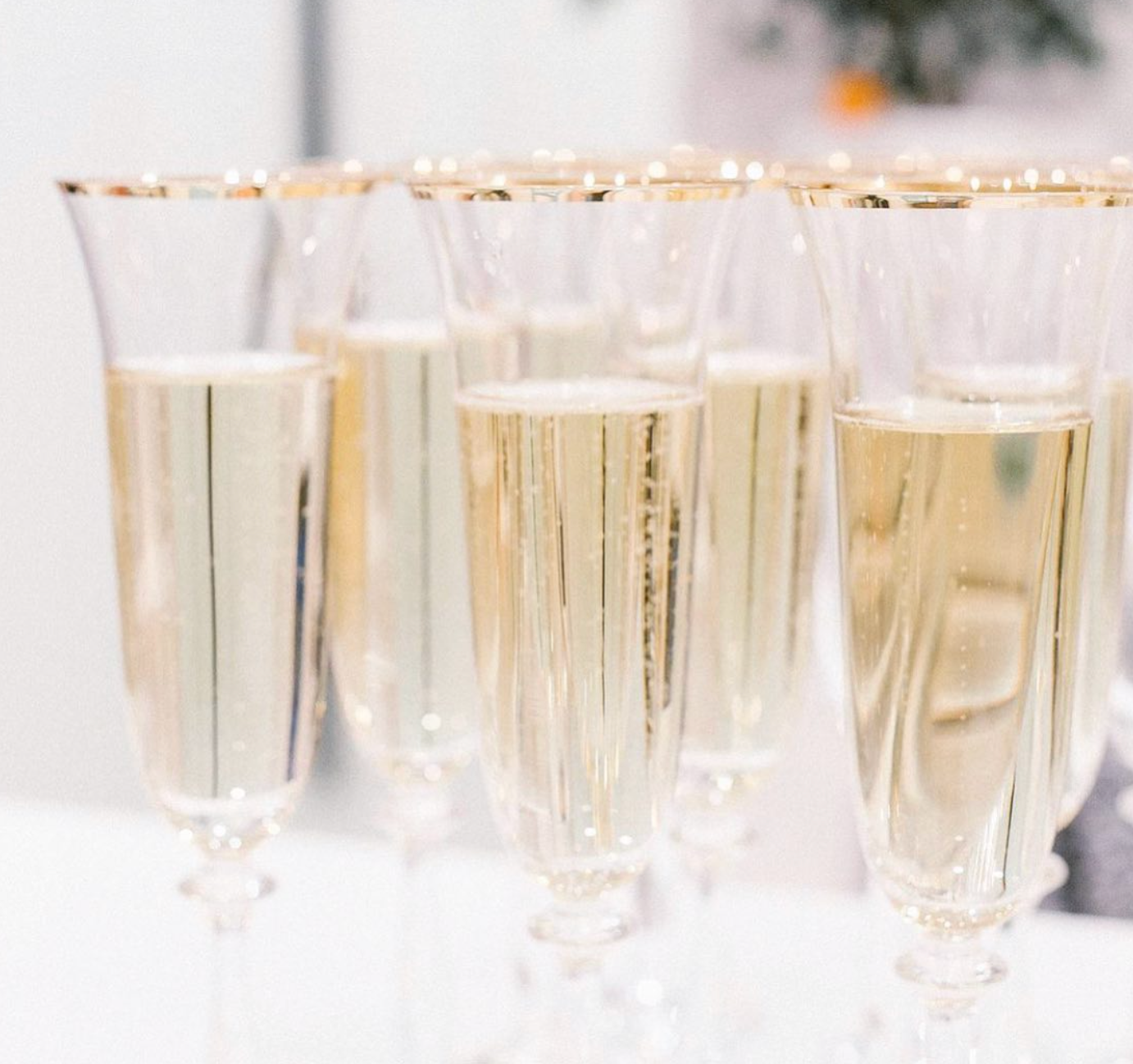 Gold rimmed champagne flute for weddings and events