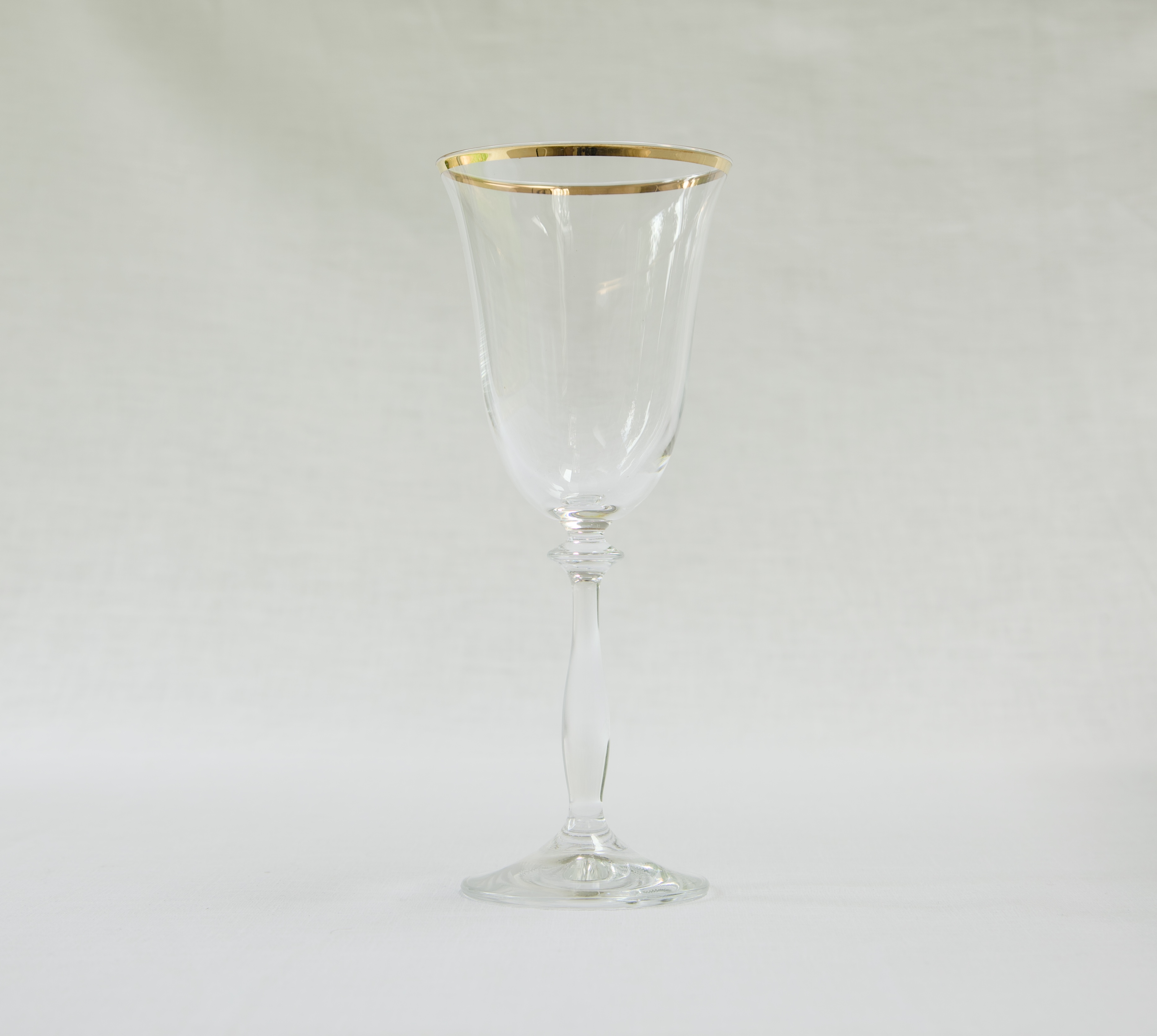 Gold Rimmed Red Wine Glass